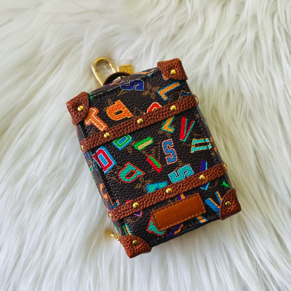 Louis Vuitton bag charm mini backpack trunk letter monogram